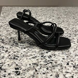 Woman’s Black Strappy Heels